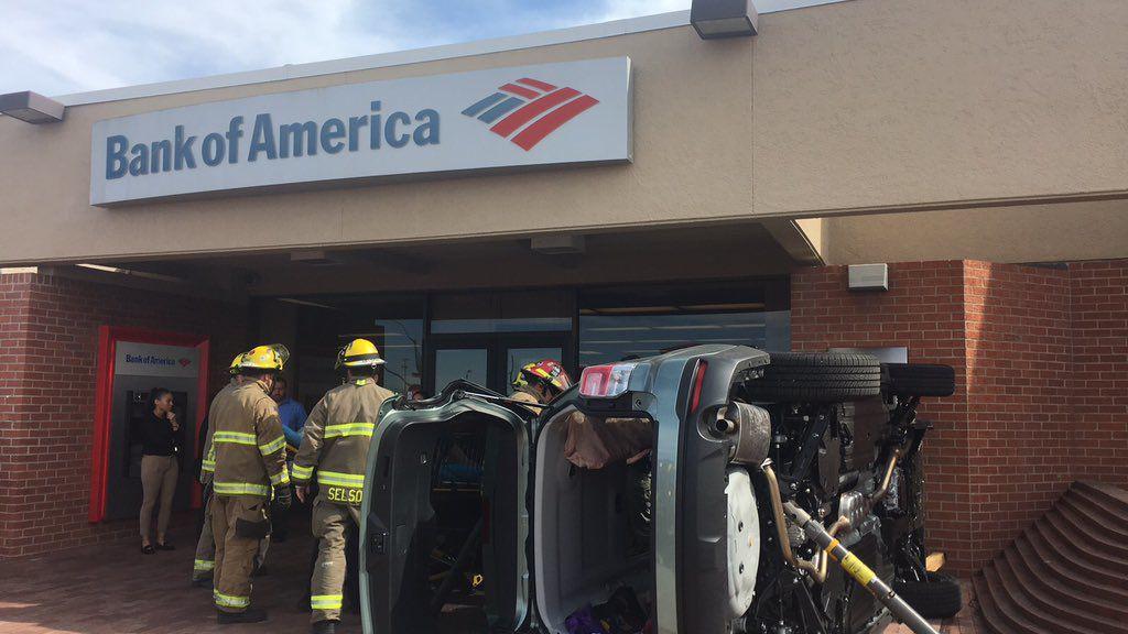 Woman flips SUV near front of Tucson Bank of America